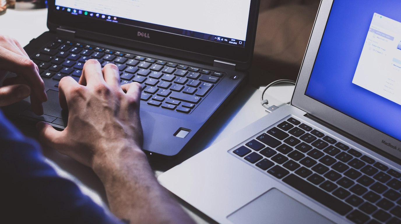 Person using a laptop at a desk